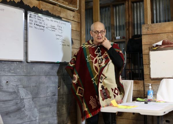 Sharing his knowledge on decolonisation.